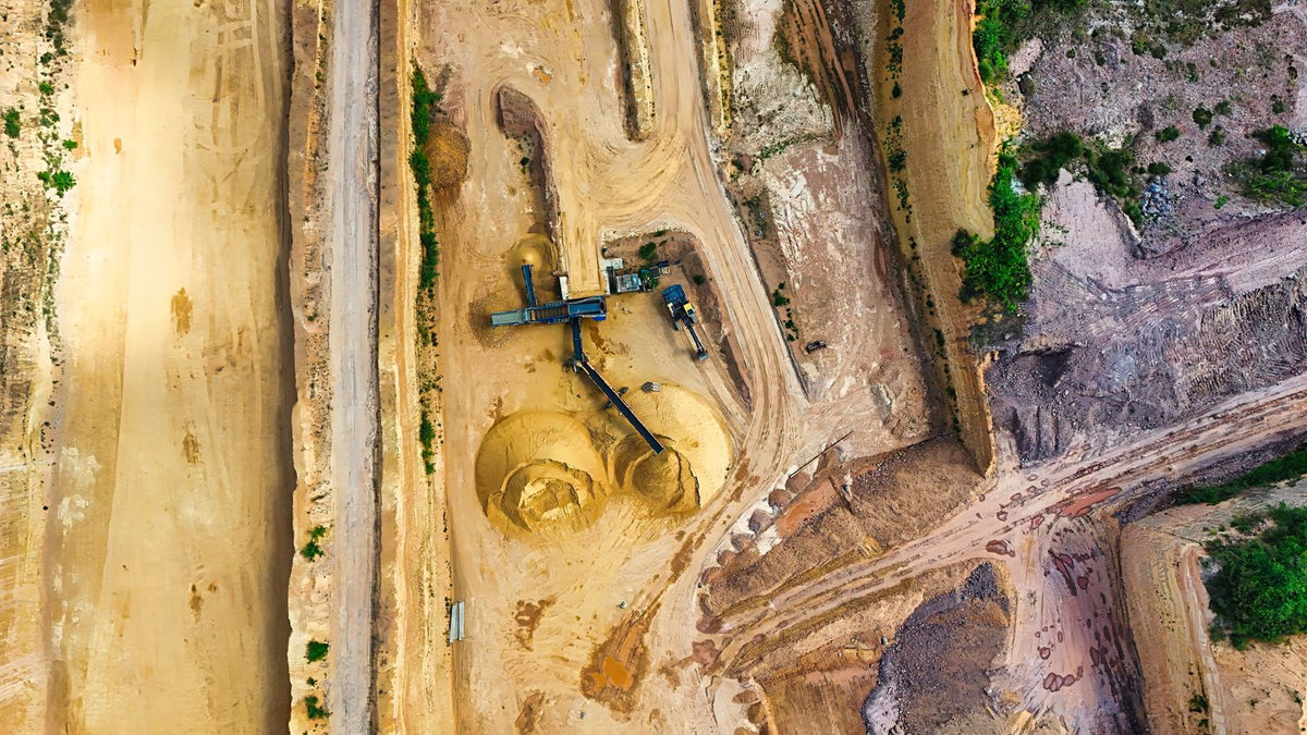 Miniera industriale a cielo aperto, materie prime e ETF commodities