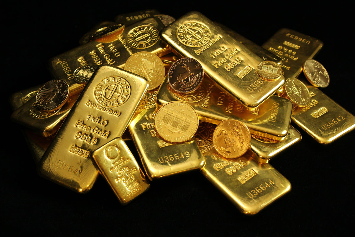Lingotti e monete d'oro per investimento